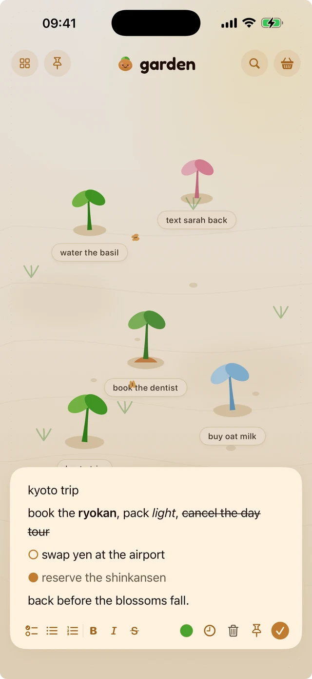 The spudnote editor on iPhone, showing bold, italic and struck-through text with a two-item checklist